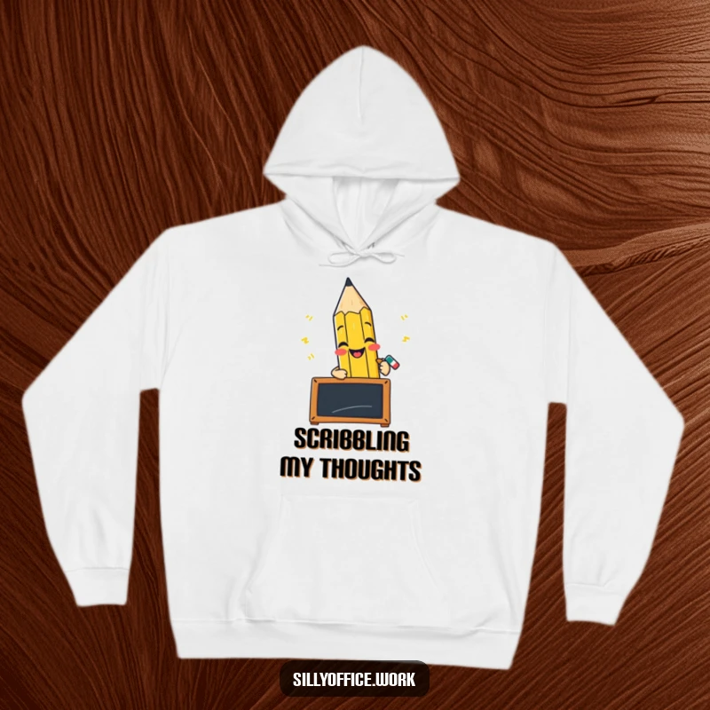 Funny hoodie depicting a cheerful pencil character furiously scribbling on a small blackboard, showing artistic energy.