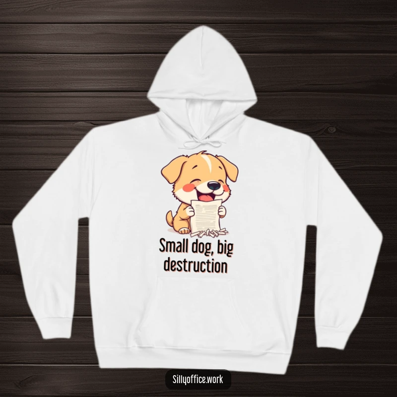 Funny Dog Hoodie: A small dog enthusiastically shreds a tiny document, bringing cozy humor and mischief.