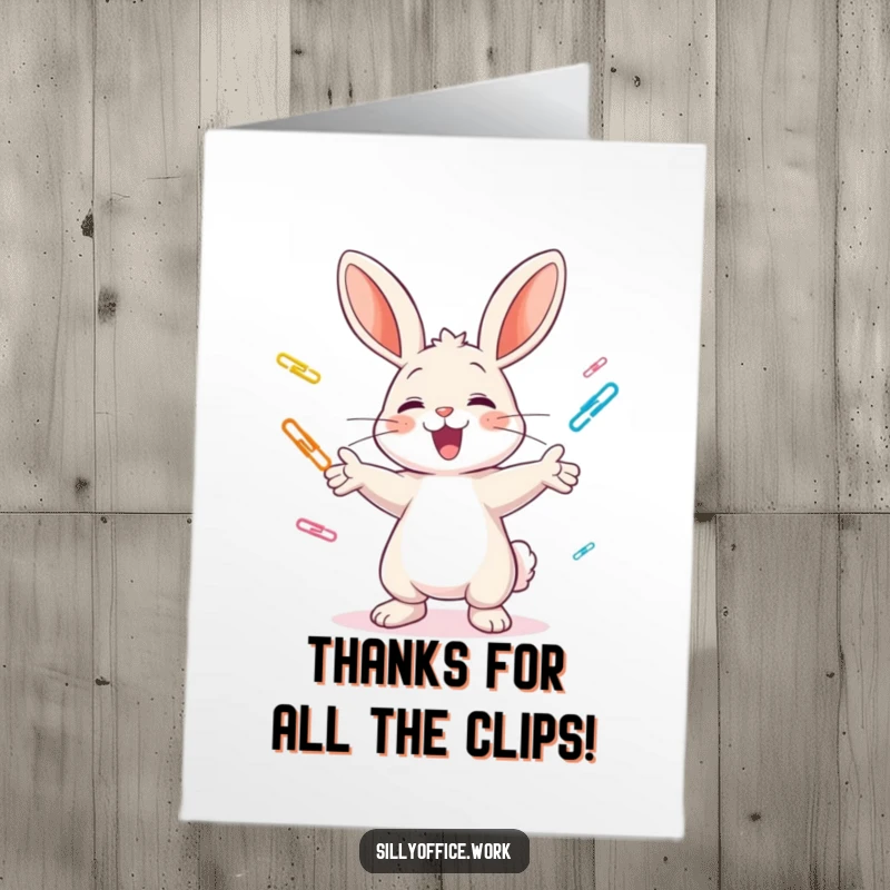 Funny Free Printable cheerful bunny excitedly juggling colorful paper clips, expressing thanks, an adorable downloadable card.