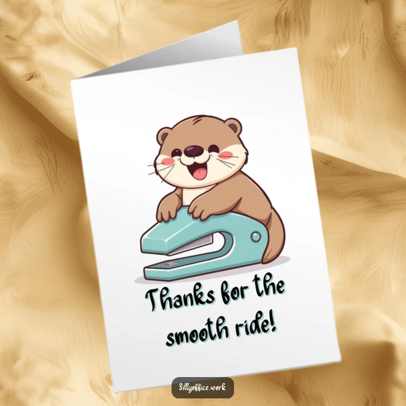 Funny Free Printable otter sliding down a stapler, looking mischievous, a fun way to say thank you downloadable card.