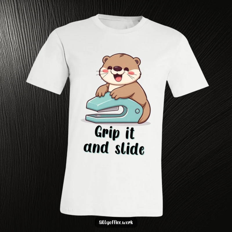 Funny t-shirt: A playful otter is gleefully sliding down a stapler, showcasing pure joy and office mischief.